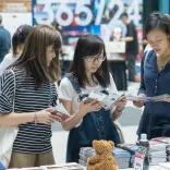 Chinesen auf Messe mit Berlin-Stand