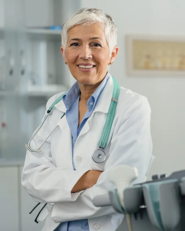Female Doctor In Her Office.