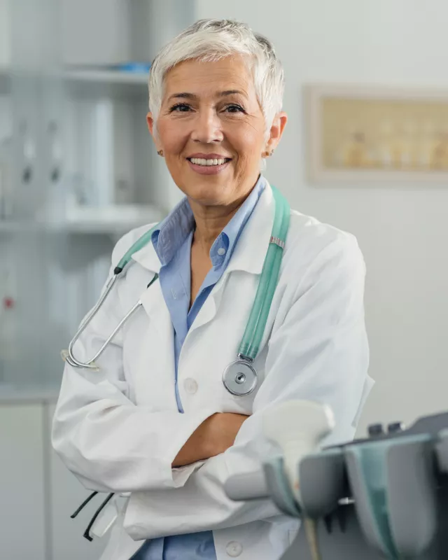 Female Doctor In Her Office.