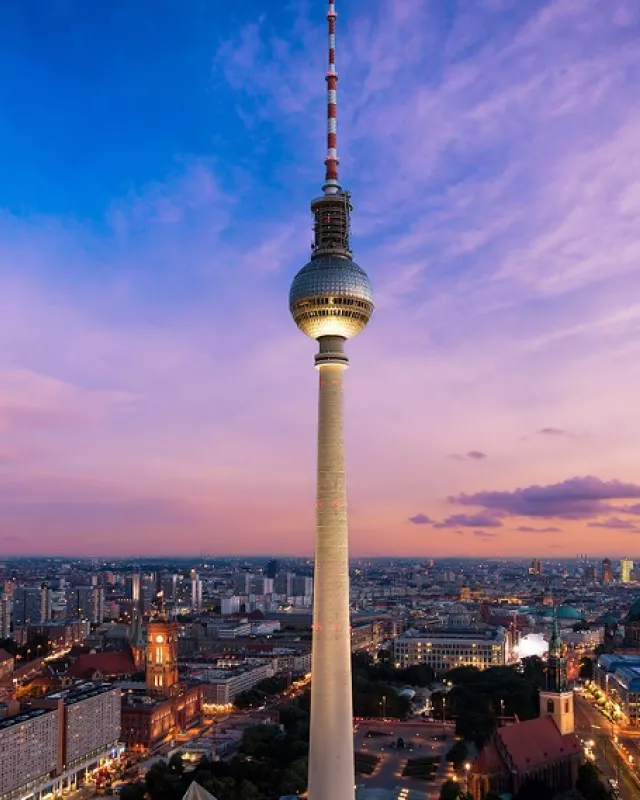 Fernsehturm Amidst Illuminated City At Night