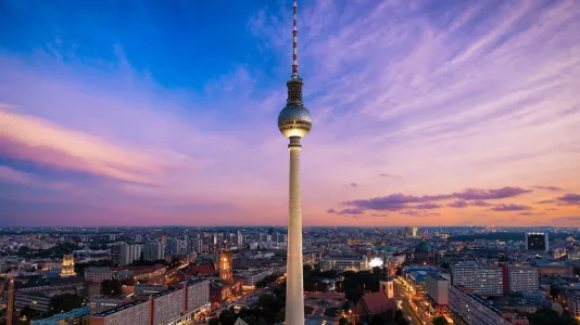 Fernsehturm Amidst Illuminated City At Night