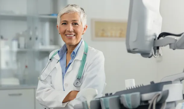Female Doctor In Her Office.