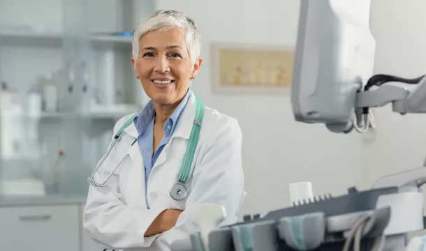 Female Doctor In Her Office.