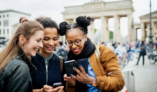 A Group Of Friends Exploring Berlin