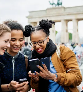 A Group Of Friends Exploring Berlin